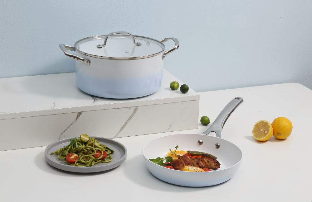 Pressed ceramic non-stick cookware set with SS die cast handle
